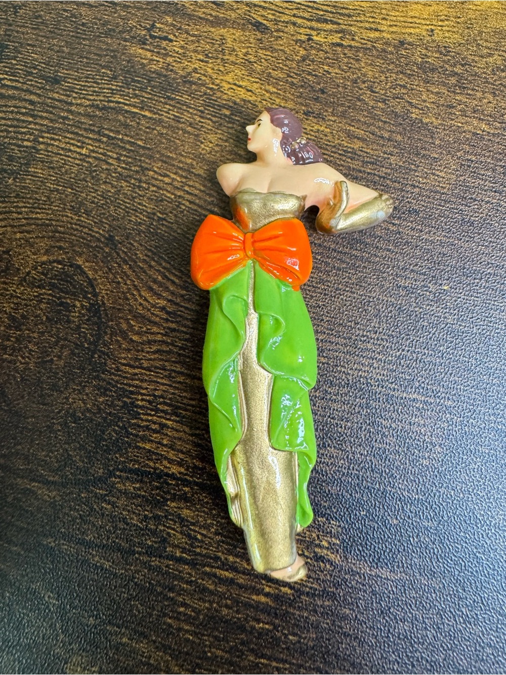 Green and Gold Lady Plastic Brooch with Orange Bow